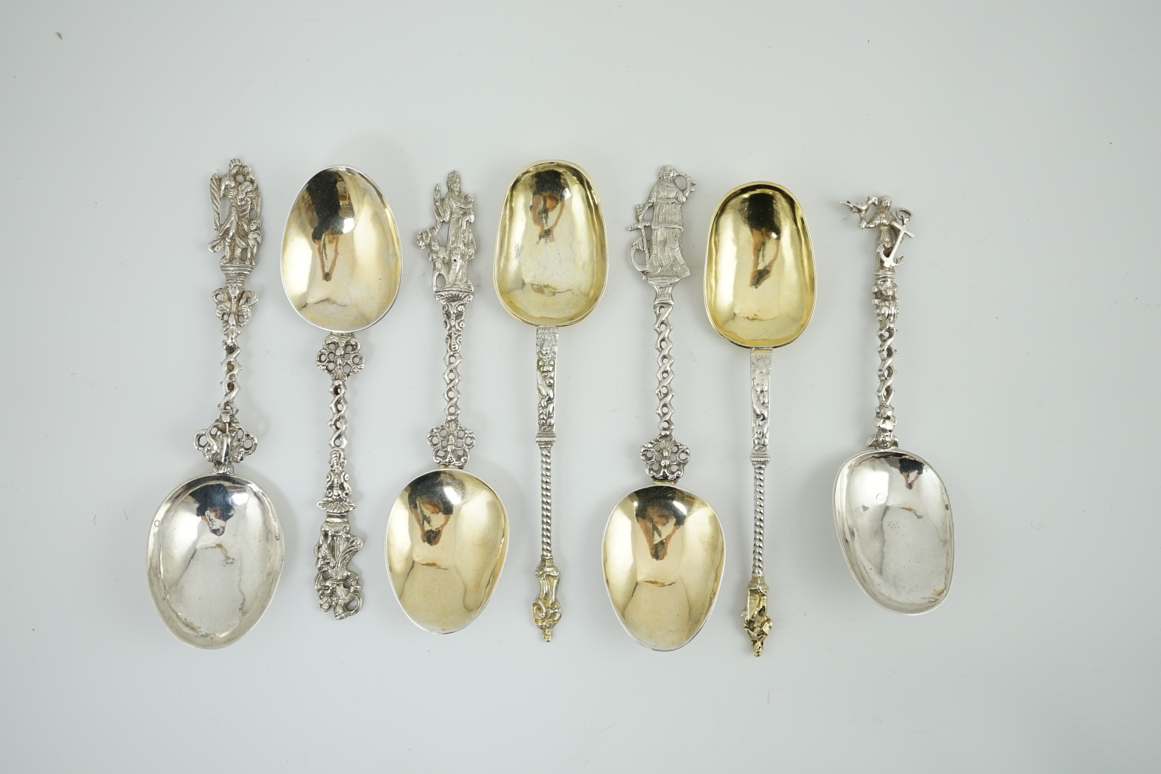 Eight assorted late 19th century continental silver historismus apostle spoons